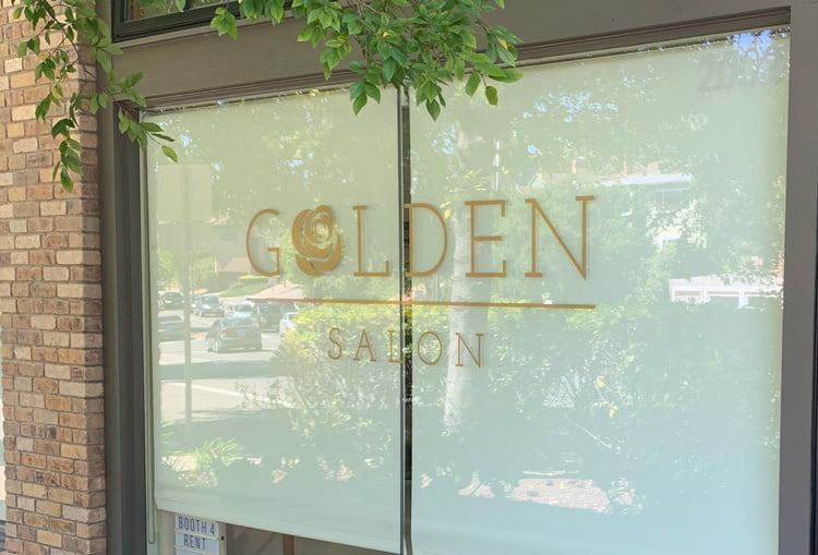 golden salon window
