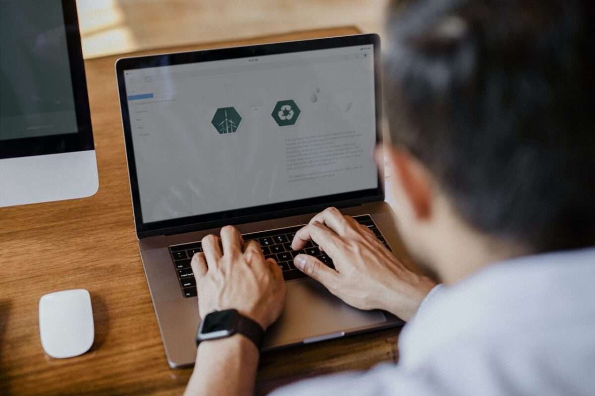 Coder Creating a Professional Website Design on his laptop