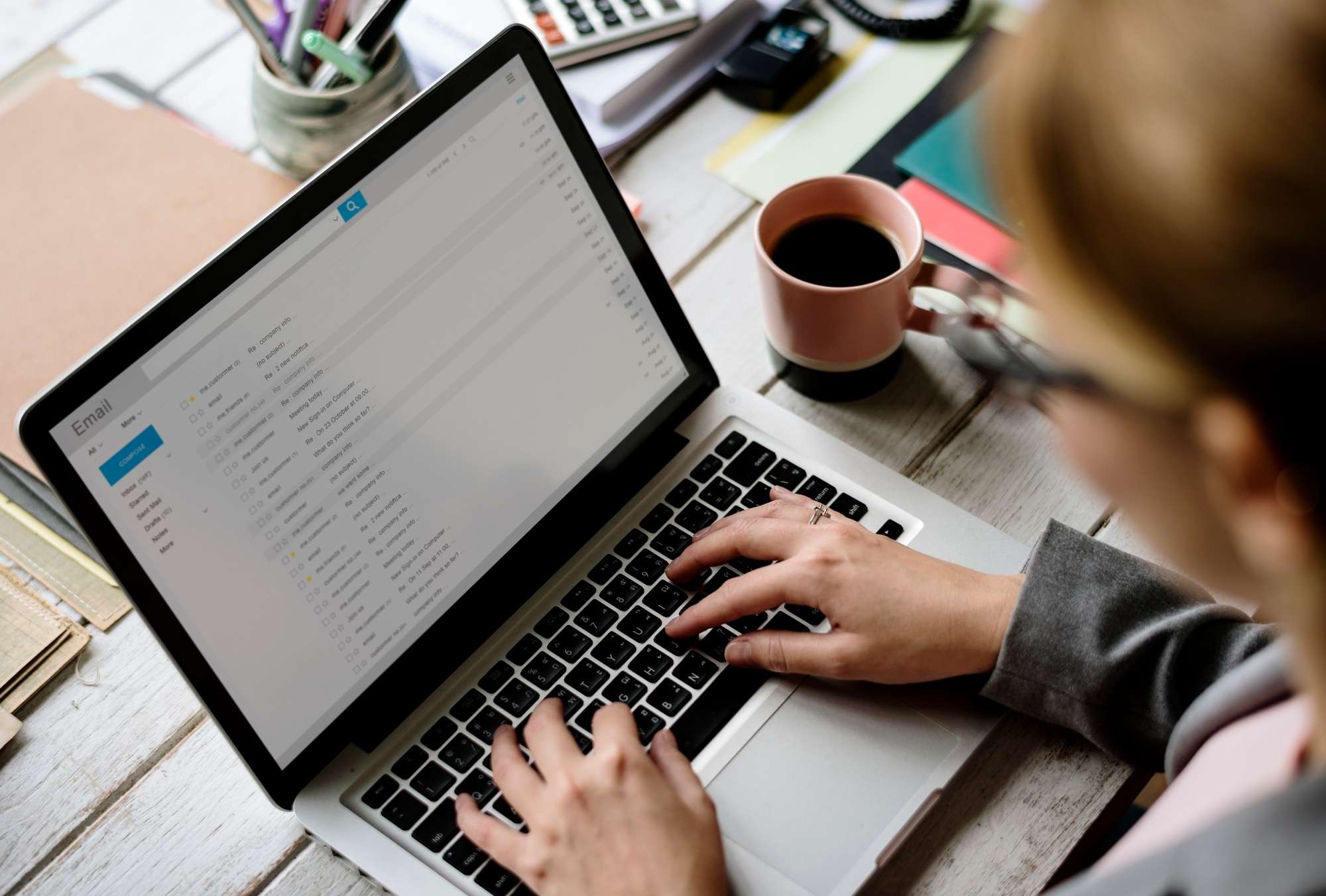 Email Marketing Campaigns 1 Businesswoman Checking E-mail Online on Laptop
