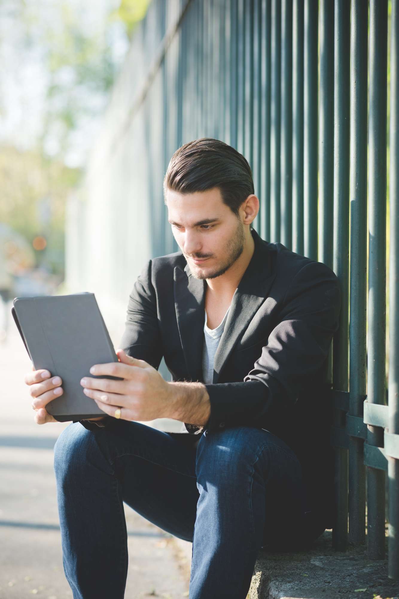 Email Marketing Campaigns 2 Portrait of a italian boy using a tablet